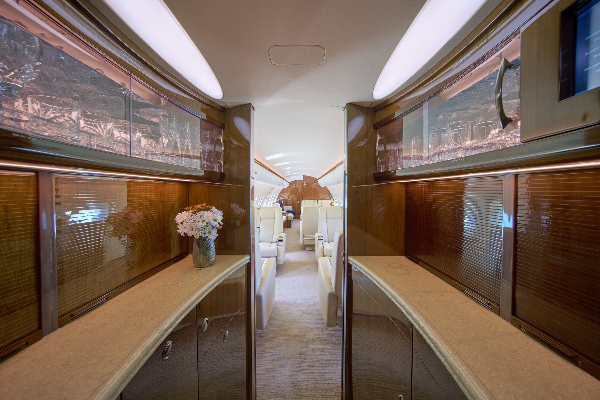 2007 Bombardier Global 5000 forward galley with crystal storage, leading into the cabin