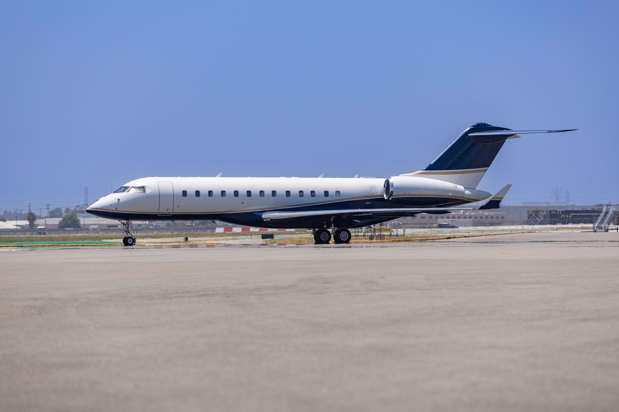 Side view of a 2006 Bombardier Global XRS jet, showcasing its sleek design and wing configuration.