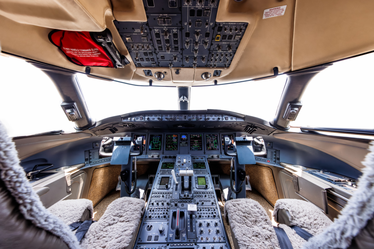 Avjet Global Sales showcases the cockpit of the 2006 Bombardier Global XRS, featuring advanced avionics and controls for superior flight management.