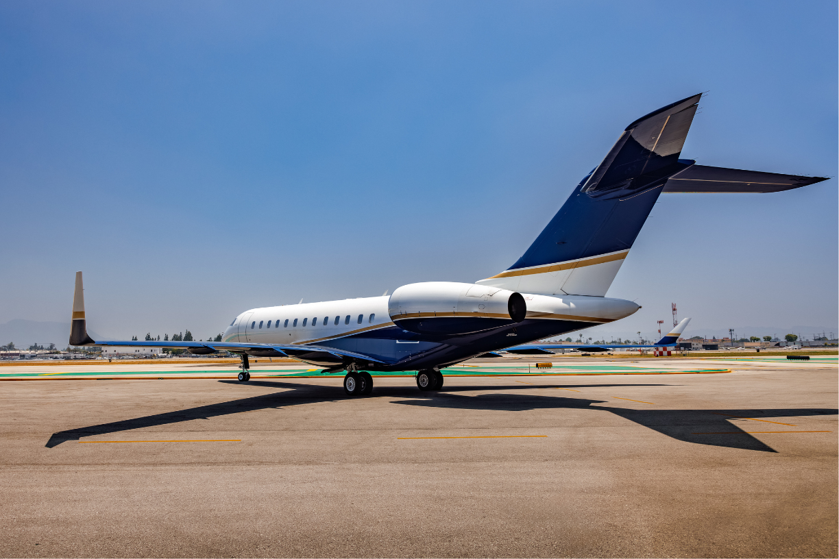 Slightly angled view of the exterior of a 2006 Bombardier Global XRS jet from the rear.