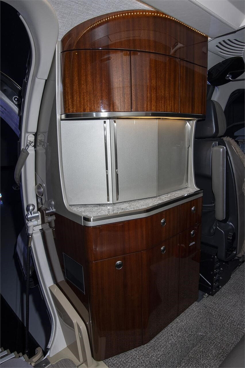 Right-hand forward slimline cabinet inside the 2023 Citation CJ4 Gen2 private jet.