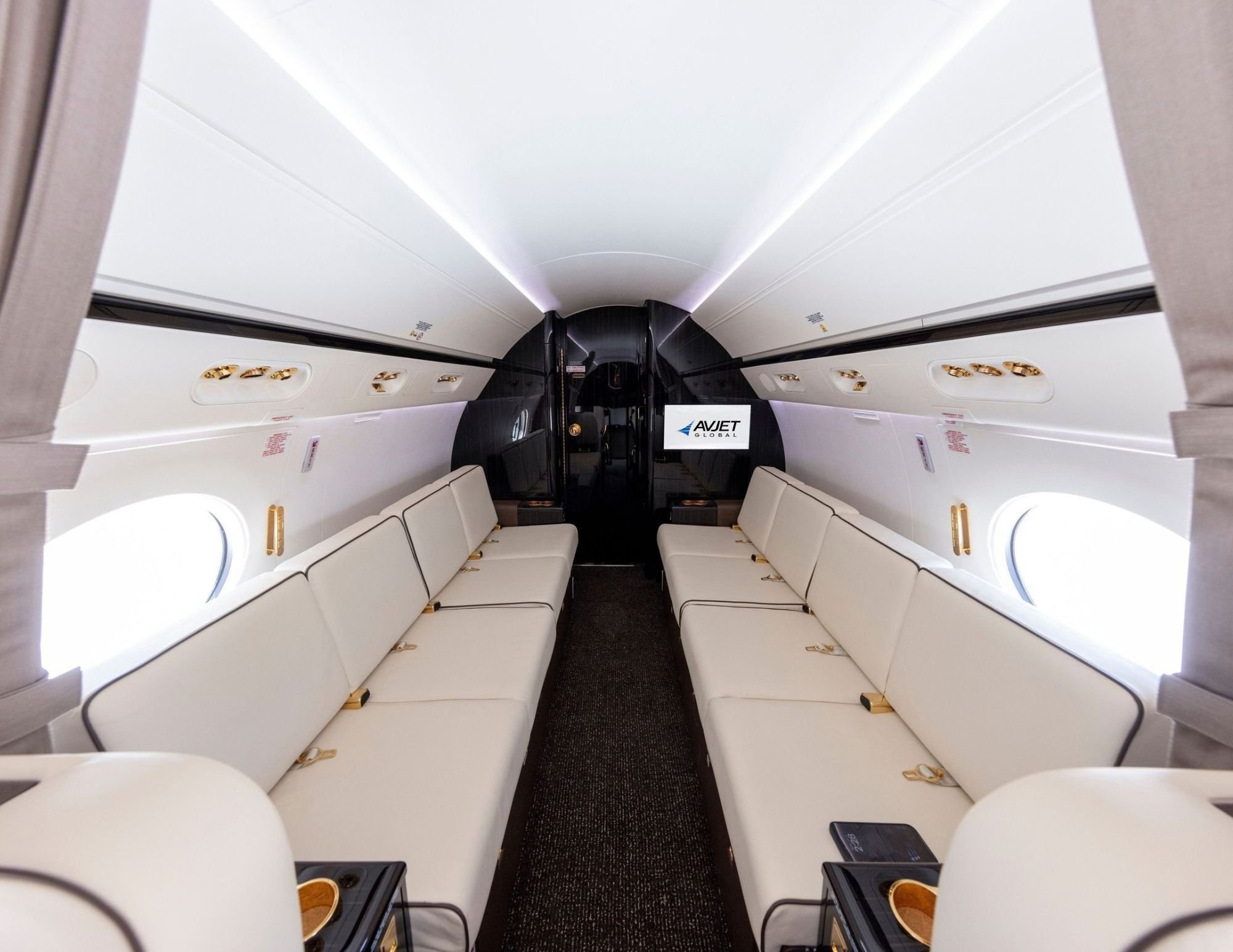 Aft cabin of a 1999 Gulfstream GV with two four-place divans, view looking aft