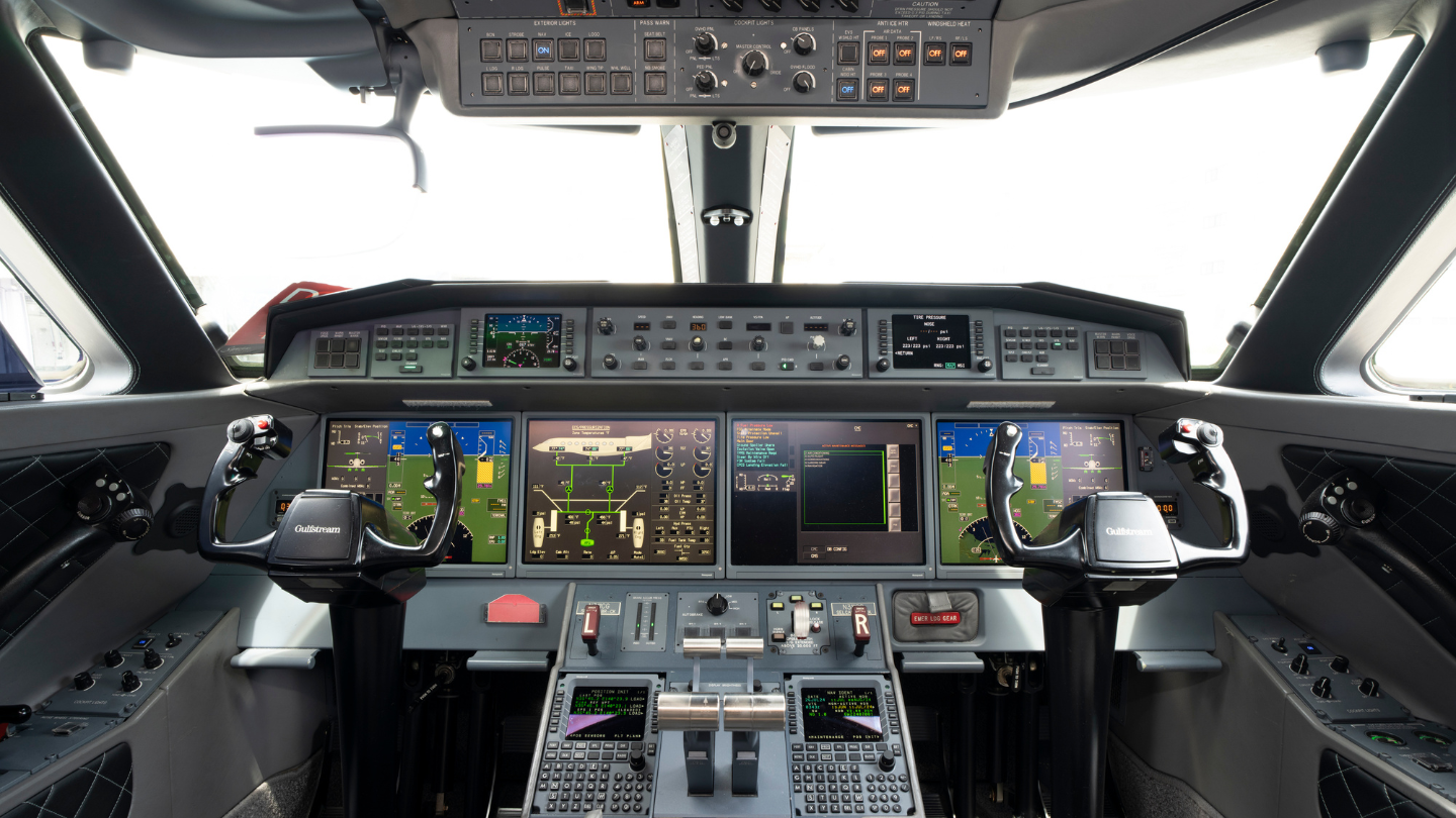 Modern cockpit of the 2014 Gulfstream G650ER equipped with advanced avionics and control panels for precise navigation and operation.