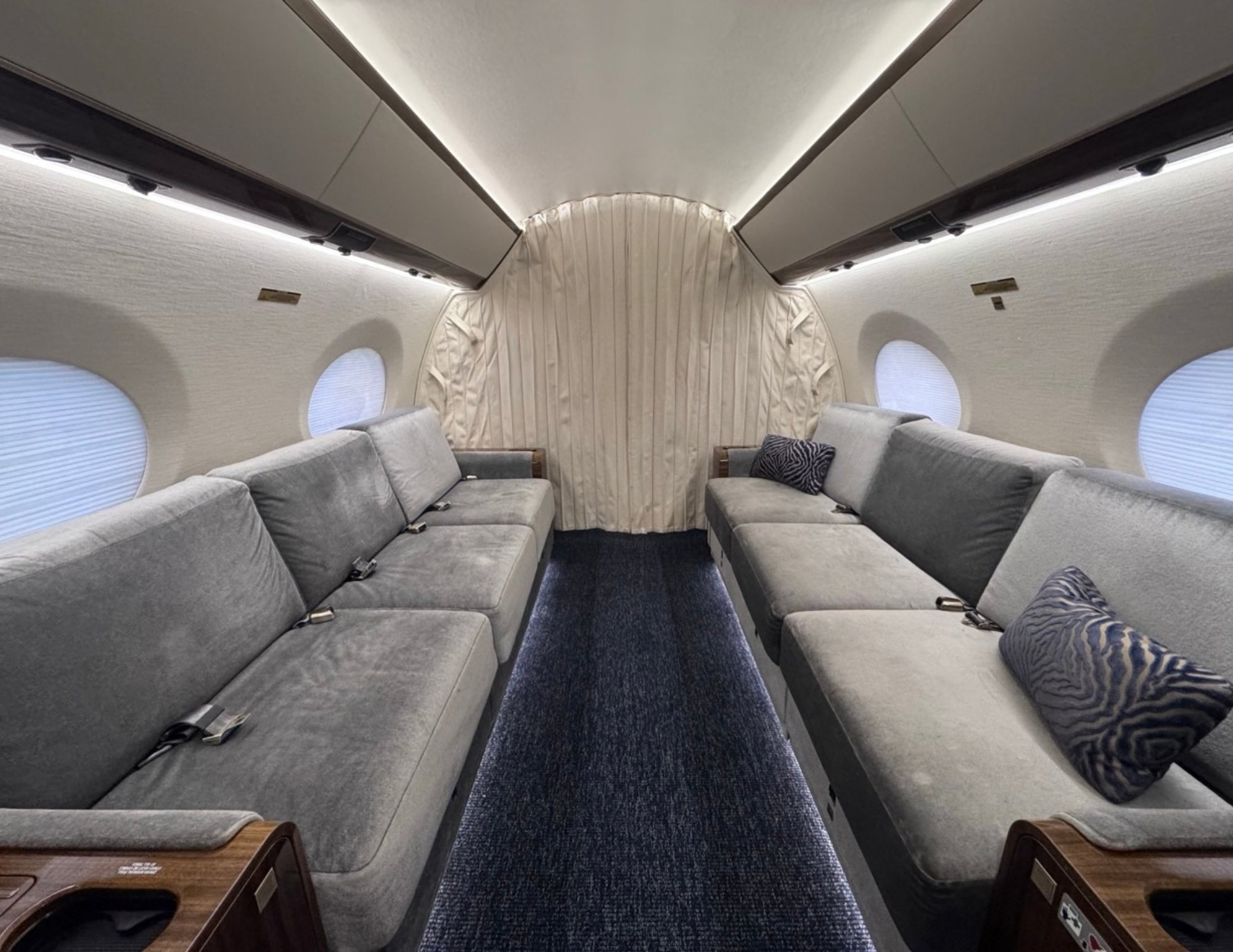 Aft cabin of a 2015 Gulfstream G650ER, view looking forward with privacy curtain