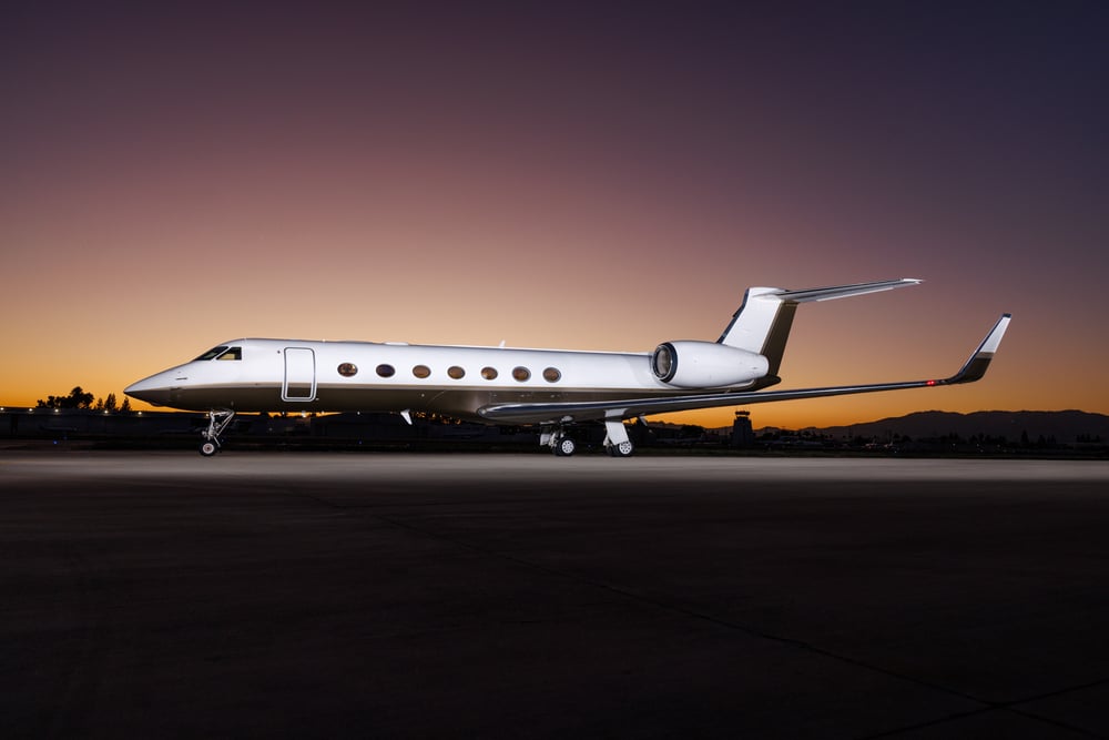 2007 Gulfstream G550 private jet for sale parked on runway at sunset, luxury business aircraft with long-range capability and modern avionics