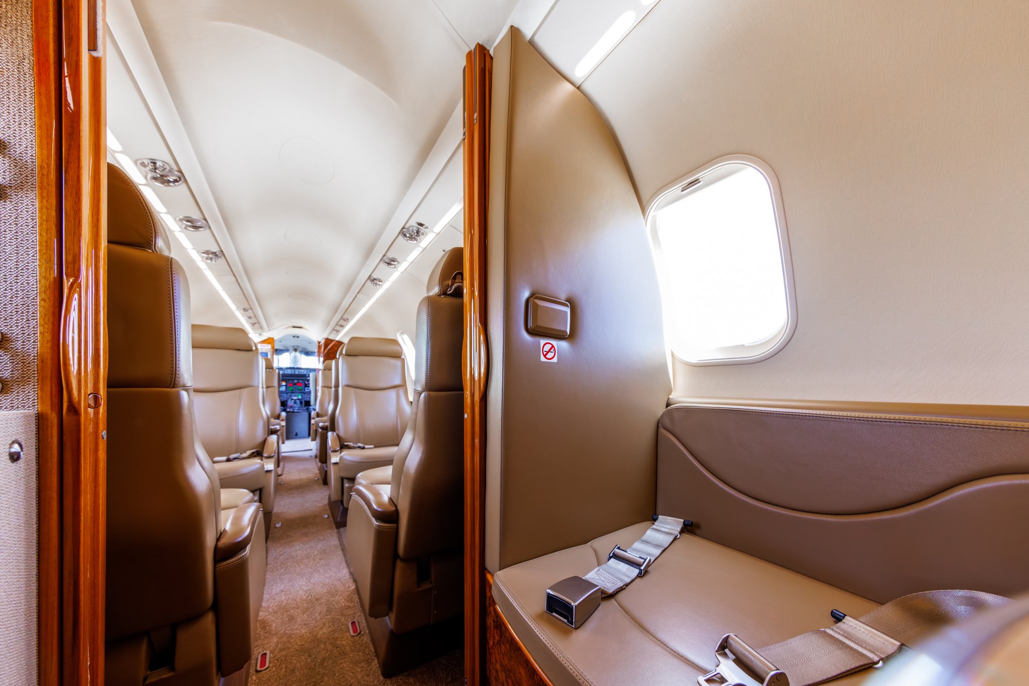 Forward view of the aft lavatory in the 2006 Learjet 45 XR, featuring modern fixtures and a clean, functional design for passenger comfort.