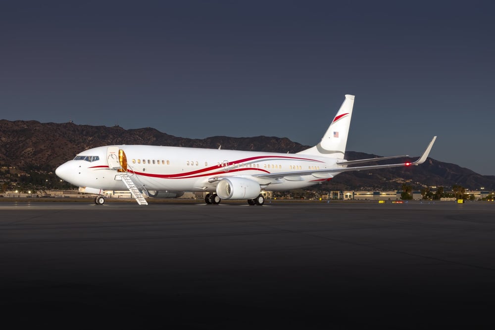 A sleek and commanding presence. This 2018 Boeing Business Jet 2 (BBJ2) combines transcontinental capability, executive comfort, and a striking white and red livery designed to stand out on any ramp.