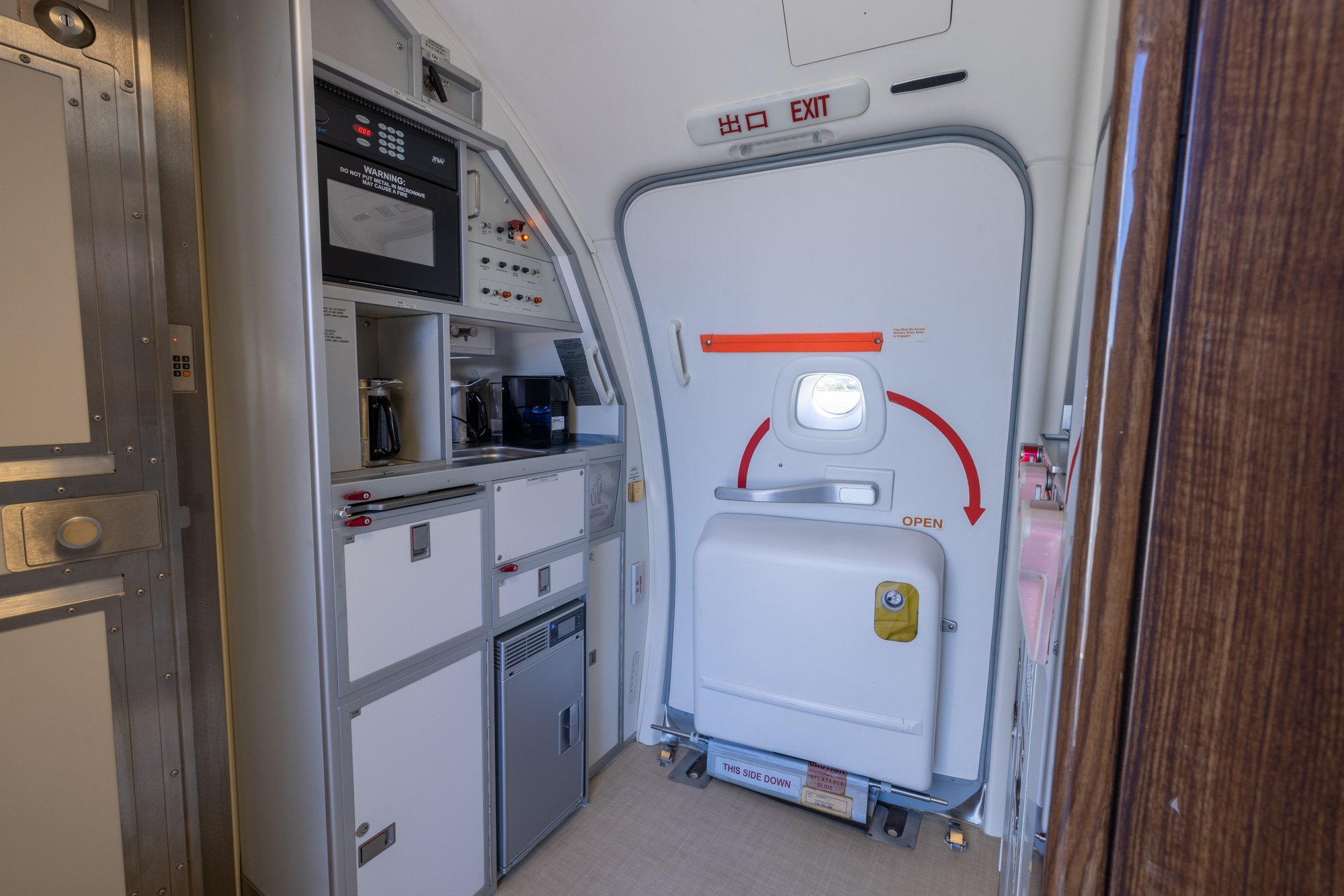 Forward Galley featuring custom cabinetry, integrated storage, and premium service amenities designed to support luxury in-flight dining aboard the Boeing Business Jet 2 (BBJ2).