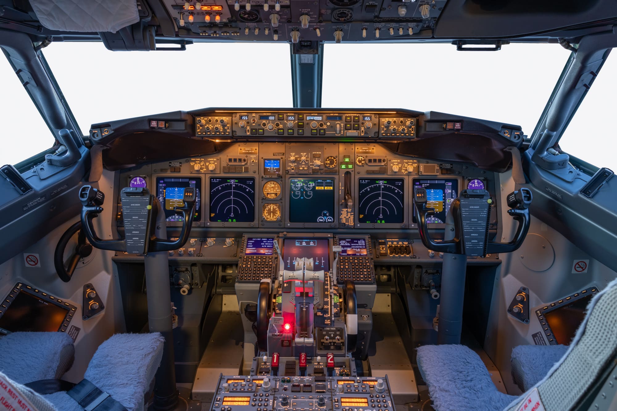 Modern BBJ2 flight deck featuring advanced avionics displays, pilot controls, and an integrated cockpit layout designed for long-range executive aviation operations.