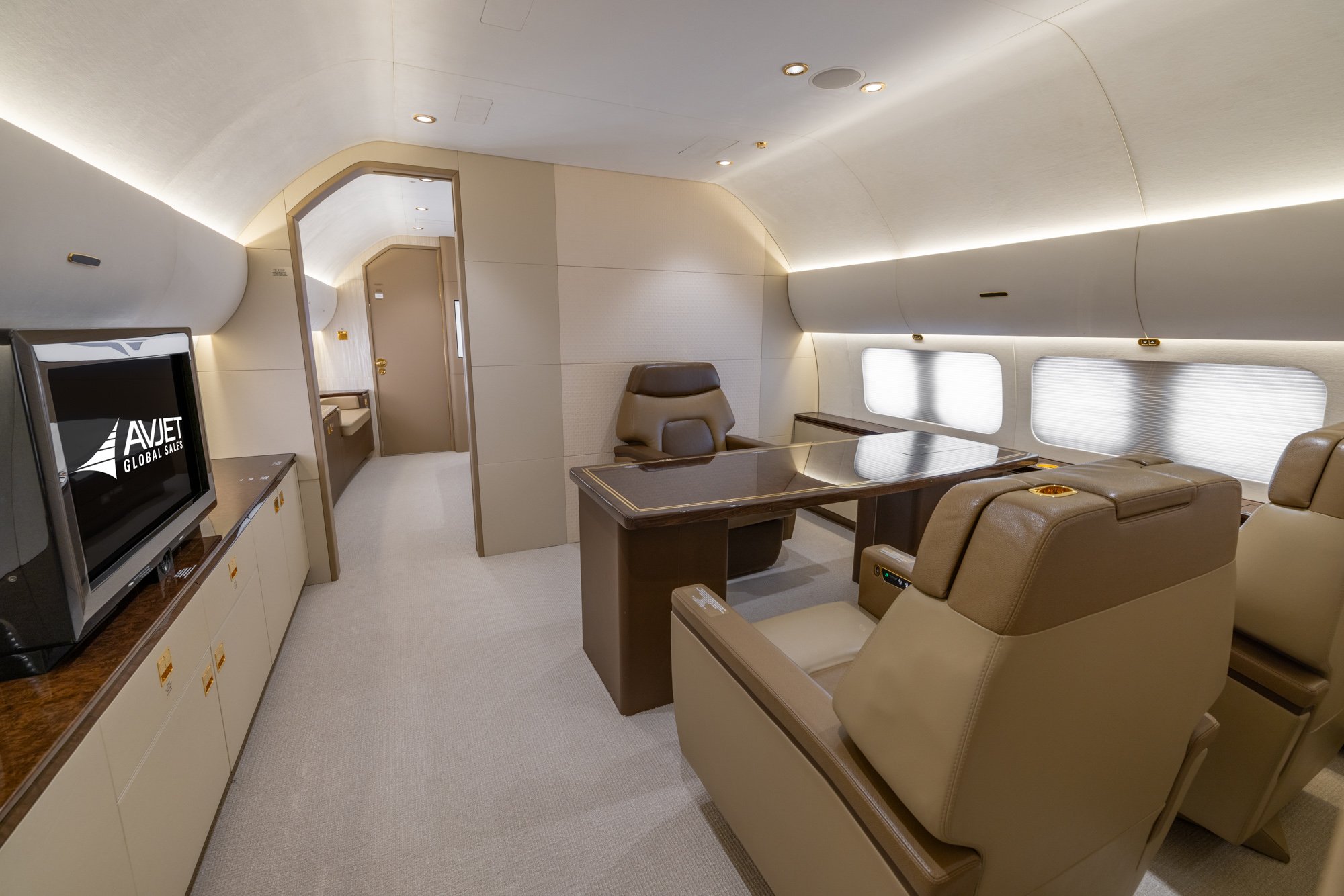 The VIP Office is designed to replicate the comfort and functionality of a private executive workspace, featuring a large display screen, spacious seating for collaborative discussions, and a dedicated work table that supports productivity throughout long-range journeys.