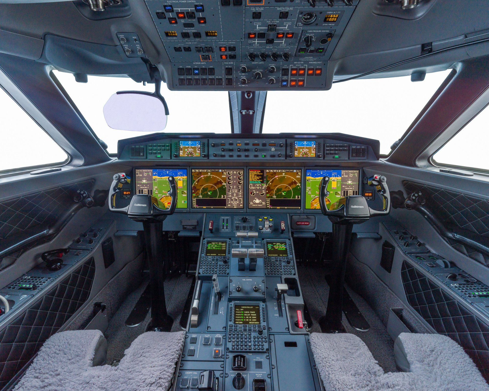 Flight deck of 2016 Gulfstream G650ER featuring advanced avionics, touchscreen displays, and Gulfstream signature yokes.