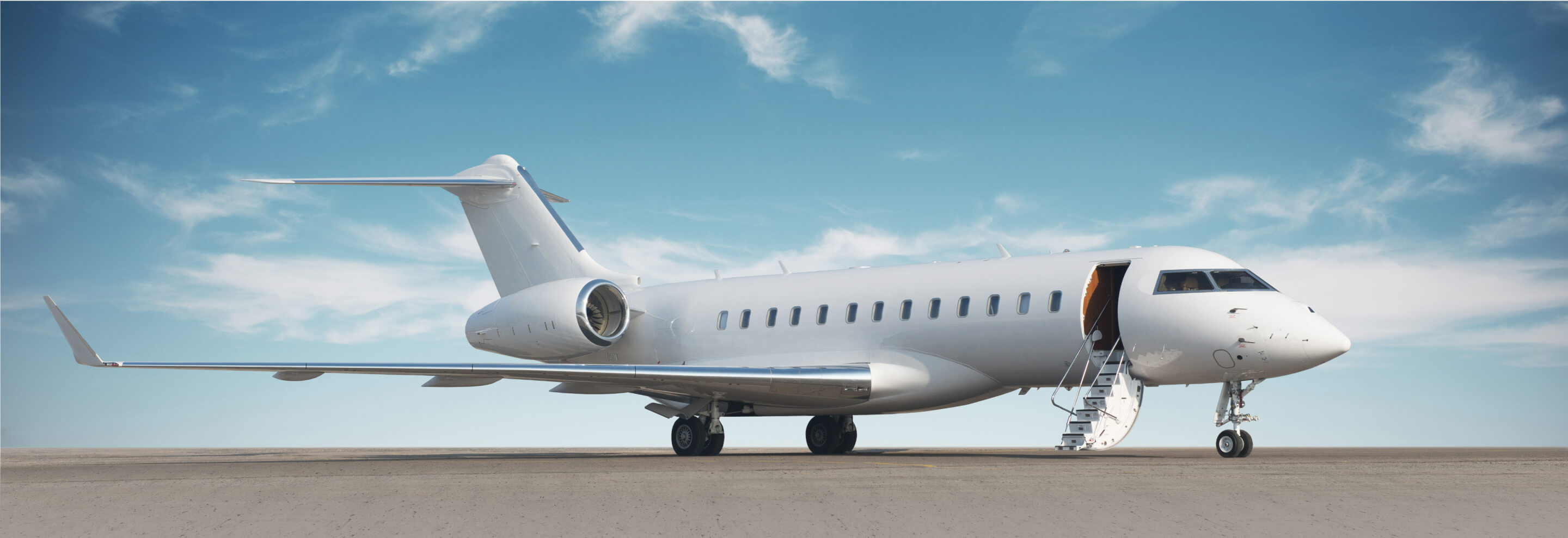 A Bombardier jet sitting on the runway